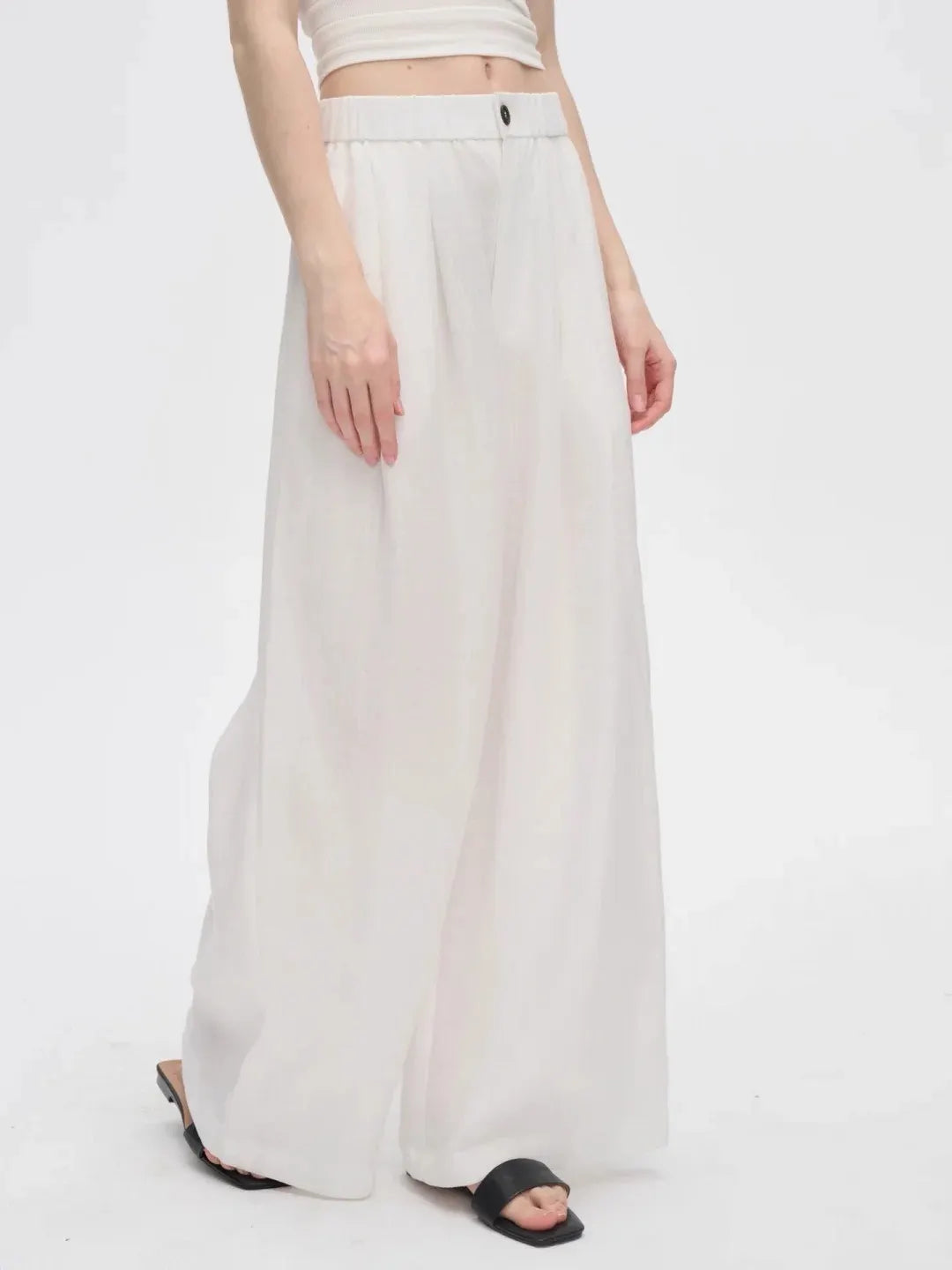 White high-waisted elasticated wide-leg pants