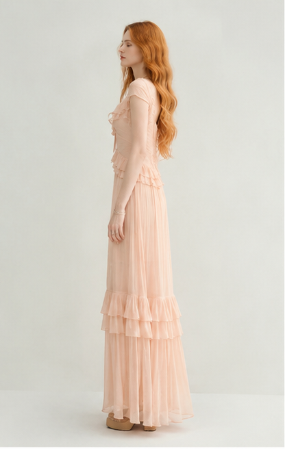 Nude-colored off-shoulder light dress